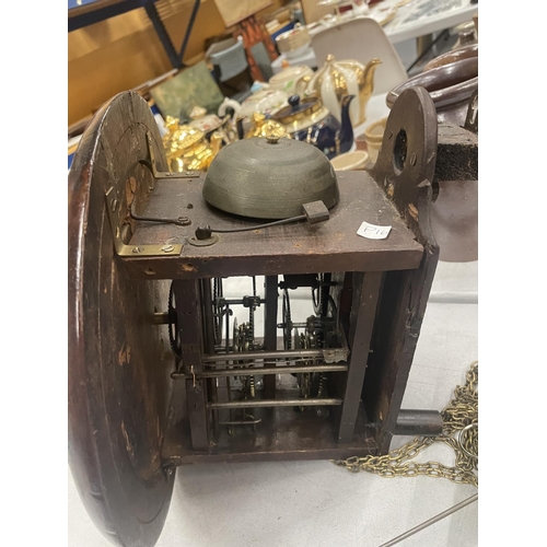 857 - A VINTAGE MAHOGANY CASED WALL CLOCK WITH FLORAL FACE WITH PENDULUM AND WEIGHTS