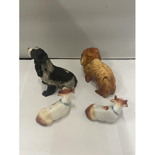 869 - A ROYAL DOULTON DOG A/F TOGETHER WITH TWO CERAMIC COWS AND A SPANIEL