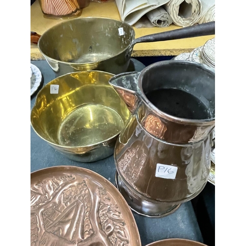 872 - A COLLECTION OF BRASS WALL PLAQUES WITH TWO COPPER PANS AND JUG