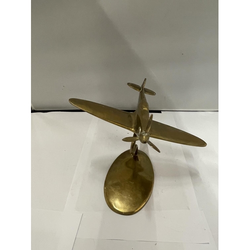 888 - A BRASS MODEL OF A SPITFIRE ON A STAND