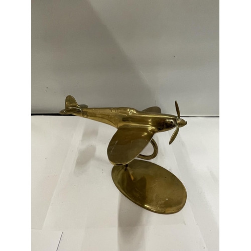 888 - A BRASS MODEL OF A SPITFIRE ON A STAND