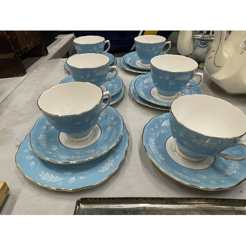 903 - FIVE COLCLOUGH BLUE AND WHITE TRIOS PLUS A CUP AND SAUCER