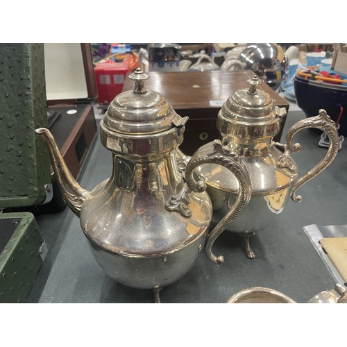 910 - A SILVER PLATED TEASET TOINCLUDE COFFEE POT, TEAPOT, CREAM JUG AND SUGAR BOWL