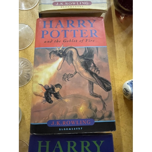 916 - THREE HARDBACK FIRST EDITIONS OF HARRY POTTER BOOKS - THE HALF-BLOOD PRINCE, THE GOBLET OF FIRE AND ... 