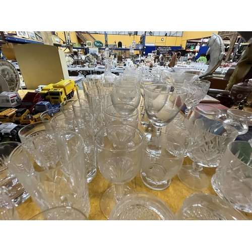 917 - A LARGE QUANTITY OF GLASSES TO INCLUDE WINE, SHERRY, TUMBLERS, PORT, ETC