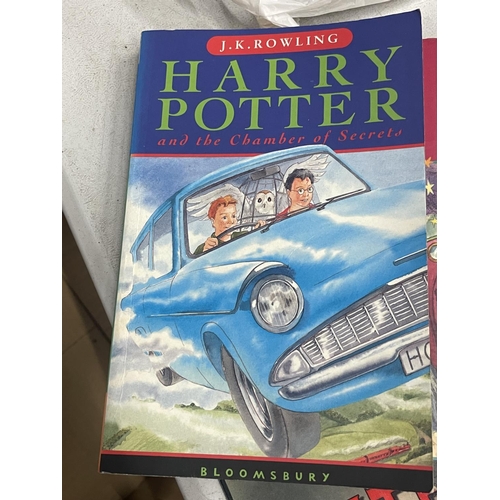 945 - THREE PAPERBACK HARRY POTTER BOOKS - THE CHAMBER OF SECRETS, THE PHILOSOPHERS STONE AND THE PRISONER... 