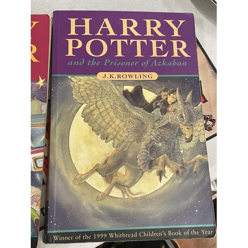 945 - THREE PAPERBACK HARRY POTTER BOOKS - THE CHAMBER OF SECRETS, THE PHILOSOPHERS STONE AND THE PRISONER... 