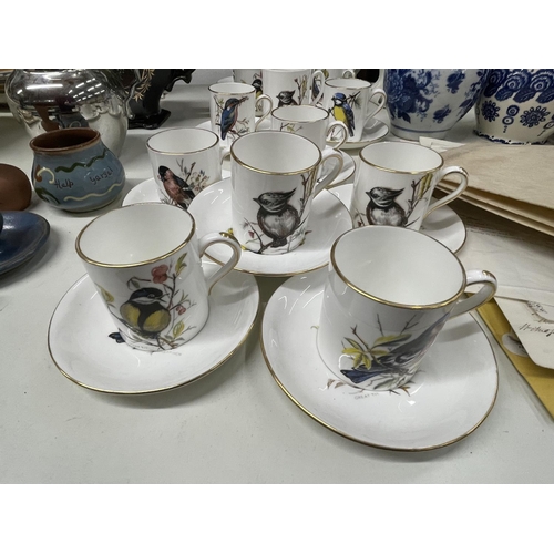 984 - A LARGE QUANTITY OF HAMMERSLEY & CO BONE CHINA COFFEE CANS AND SAUCERSWITH BIRD DESIGN TO THE CUP AN... 