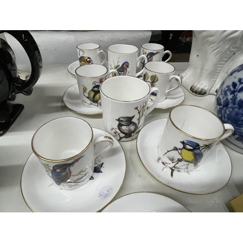 984 - A LARGE QUANTITY OF HAMMERSLEY & CO BONE CHINA COFFEE CANS AND SAUCERSWITH BIRD DESIGN TO THE CUP AN... 