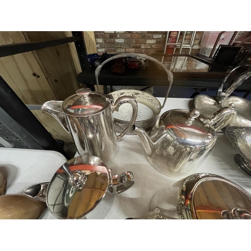 995A - A QUANTITY OF SILVER PLATED ITEMS TO INCLUDE COFFEE AND TEAPOTS, A SUGAR SHAKER, A HANDLED BOWL, SER... 