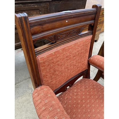 2481 - A PAIR OF VICTORIAN UPHOLSTERED ELBOW CHAIRS ON TURNED LEGS AND UPRIGHTS