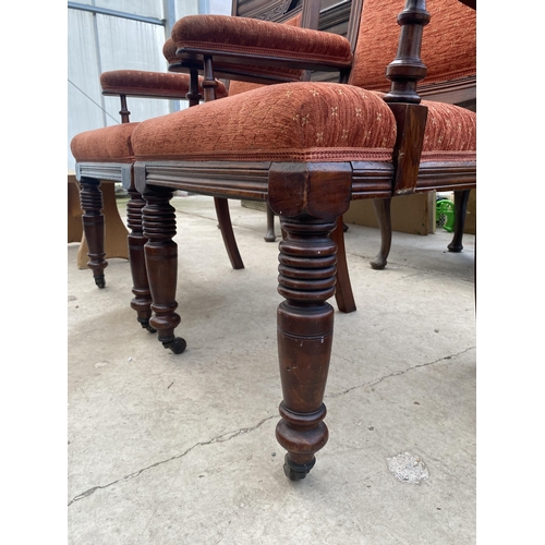 2481 - A PAIR OF VICTORIAN UPHOLSTERED ELBOW CHAIRS ON TURNED LEGS AND UPRIGHTS