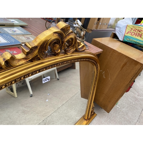 2523B - A MODERN GILT FRAMED OVERMANTEL MIRROR, 50X36