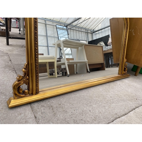 2523B - A MODERN GILT FRAMED OVERMANTEL MIRROR, 50X36