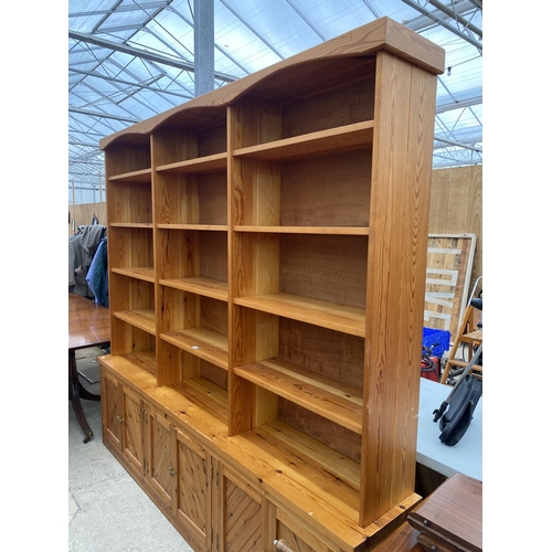 2531 - LARGE MODERN PINE FIFTEEN DIVISION OPEN SHELVES WITH SIX CUPBOARDS TO THE BASE, 91