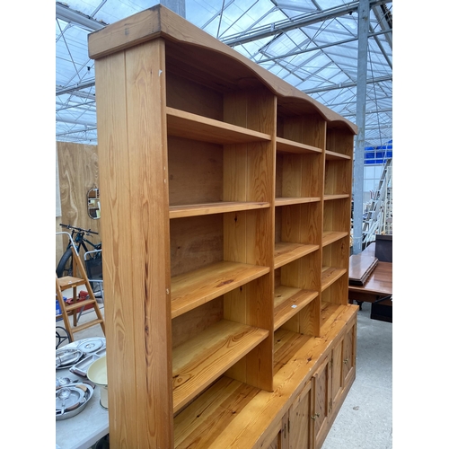 2531 - LARGE MODERN PINE FIFTEEN DIVISION OPEN SHELVES WITH SIX CUPBOARDS TO THE BASE, 91