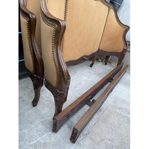 2548 - A CONTINENTAL 4' BEDSTEAD WITH CURVED AND STUDDED HEAD AND FOOT