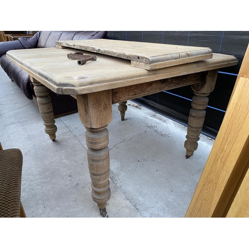 2558 - A VICTORIAN PINE WIND-OUT DINING TABLE WITH CANTED CORNERS, 41