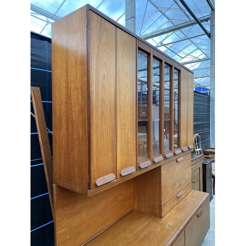 2564 - A RETRO TEAK COCKTAIL SIDEBOARD WITH FOUR BI-FOLD DOORS, TWO BEING GLAZED, DROP-DOWN COCKTAIL SECTIO... 