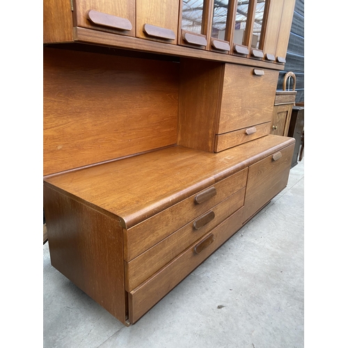 2564 - A RETRO TEAK COCKTAIL SIDEBOARD WITH FOUR BI-FOLD DOORS, TWO BEING GLAZED, DROP-DOWN COCKTAIL SECTIO... 