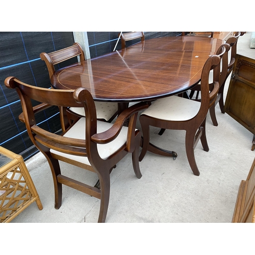 2566 - A REGENCY STYLE MAHOGANY TWIN-PEDESTAL EXTENDING DINING TABLE, 63X39