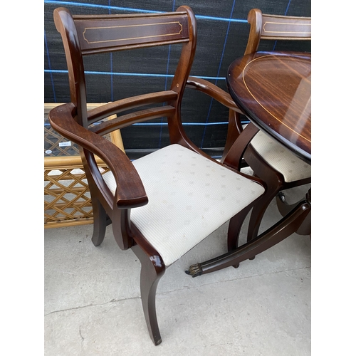 2566 - A REGENCY STYLE MAHOGANY TWIN-PEDESTAL EXTENDING DINING TABLE, 63X39