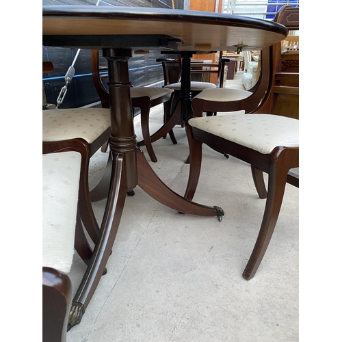 2566 - A REGENCY STYLE MAHOGANY TWIN-PEDESTAL EXTENDING DINING TABLE, 63X39