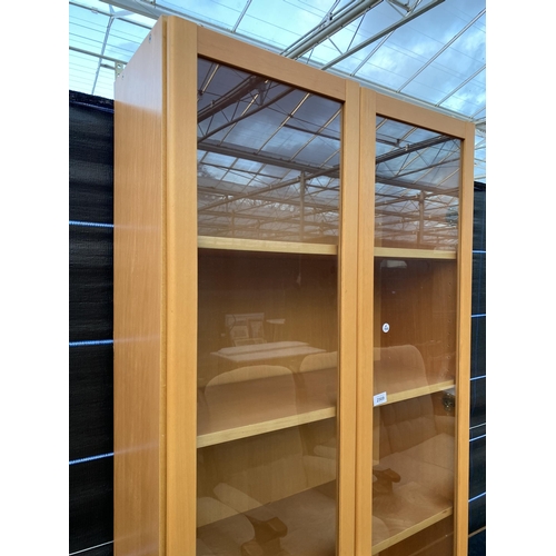 2569 - A MODERN TWO DOOR GLAZED SIX TIER DISPLAY CABINET, 31