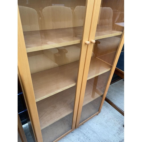 2569 - A MODERN TWO DOOR GLAZED SIX TIER DISPLAY CABINET, 31