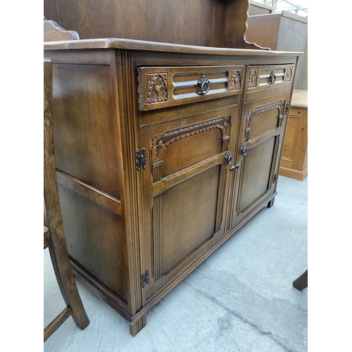 2583 - A REPRODUCTION OAK DRESSER BEARING LABEL 'ALLAN'S, HANLEY & STOKE' COMPLETE WITH PLATE RACK, 50