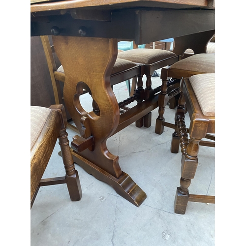 2584 - A REPRODUCTION OAK DRAW-LEAF DINING TABLE AND SIX LADDERBACK DINING CHAIRS