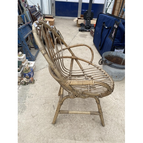 1525 - A SMALL BAMBBO AND WICKER GARDEN CHAIR