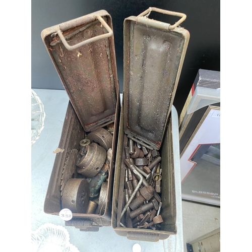 1559 - TWO AMMO TINS CONTAINING AN ASSORTMENT OF HARDWARE TO INCLUDE NUTS AND BOLTS ETC