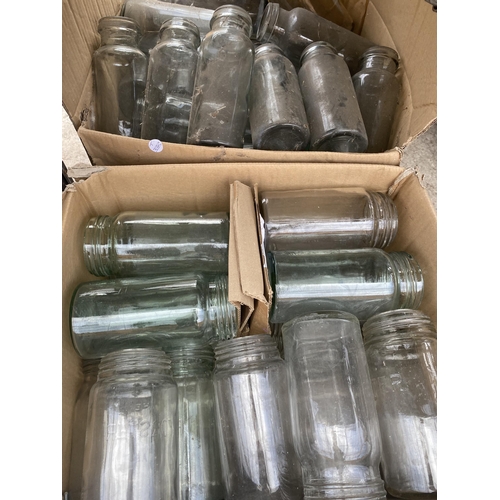 1564 - A LARGE QUANTITY OF GLASS JARS