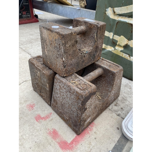 1570 - TWO VINTAGE CAST IRON 56LB WEIGHTS AND A FURTHER 28LB WEIGHT