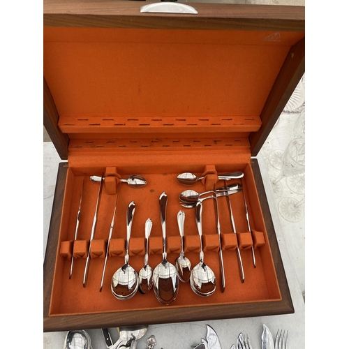 1628 - A PART COMPLETE TEAK CANTEEN OF CUTLERY