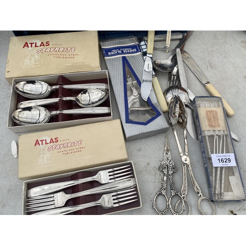 1629 - A LARGE ASSORTMENT OF FLATWARE