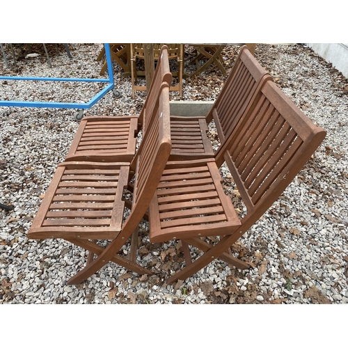 1641 - FOUR FOLDING TEAK GARDEN CHAIRS