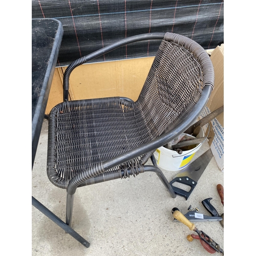 1662 - A SQUARE GLASS TOPPED BISTRO TABLE WITH TWO RATTAN STYLE CHAIRS