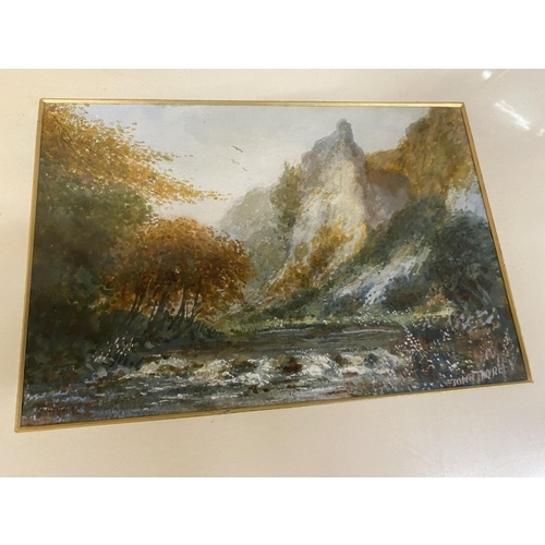 426 - A FRAMED WATERCOLOUR OF A MOUNTAIN AND LAKE SCENE, SIGNED TO BOTTOM RIGHT 54CM X 41CM