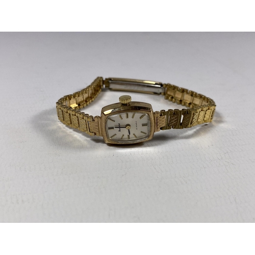 737 - A 9CT YELLOW GOLD CASED LADIES ACCURIST WATCH