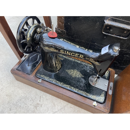 2422 - A SINGER MANUAL SEWING MACHINE (NO. Y 695580)