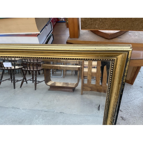 2525 - A MODERN GILT WALL MIRROR, 44X35