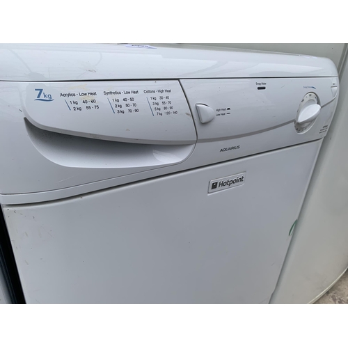 2053 - A WHITE HOTPOINT 7KG CONDENSER DRYER BELIEVED IN WORKING ORDER BUT NO WARRANTY