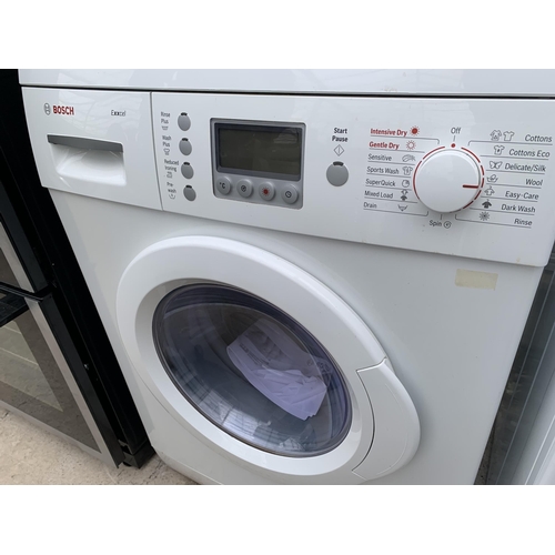 2056 - A WHITE BOSCH EXXCEL WASHER DRYER WITH INSTRUCTION MANUAL