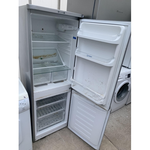 2060 - A SILVER INDESIT UPRIGHT FRIDGE FREEZER