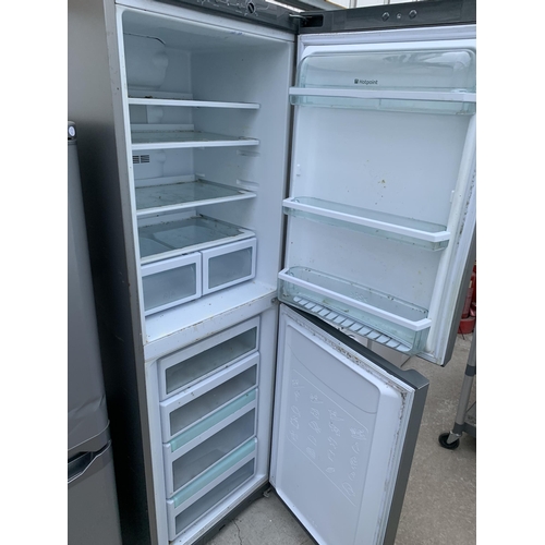 2061 - A SILVER HOTPOINT UPRIGHT FRIDGE FREEZER