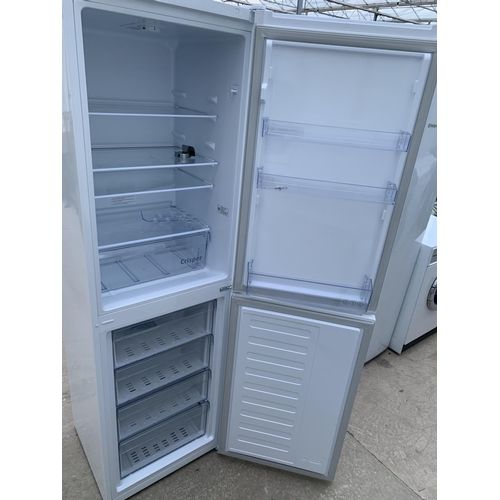 2066 - A WHITE BEKO UPRIGHT FRIDGE FREEZER