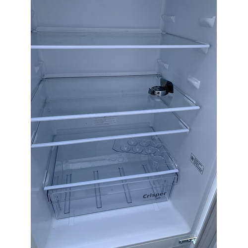 2066 - A WHITE BEKO UPRIGHT FRIDGE FREEZER