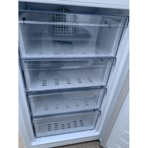 2066 - A WHITE BEKO UPRIGHT FRIDGE FREEZER